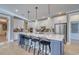 Modern kitchen features a spacious center island, stainless appliances, and pendant lighting at 543 Oak Landing Dr., Myrtle Beach, SC 29588