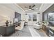 Stylish home office features a tray ceiling, shiplap accent wall, and modern furnishings at 543 Oak Landing Dr., Myrtle Beach, SC 29588
