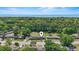 Scenic aerial view showcasing a property near lush trees with an ocean view in the background at 558 Juniper Dr., Myrtle Beach, SC 29577