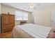 Bedroom with ceiling fan, parquet floors, and natural light at 558 Juniper Dr., Myrtle Beach, SC 29577
