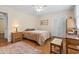 Bedroom featuring parquet flooring, ceiling fan, and window at 558 Juniper Dr., Myrtle Beach, SC 29577