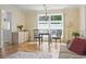 Bright dining area featuring a dark table and chairs with neutral walls and floors at 558 Juniper Dr., Myrtle Beach, SC 29577