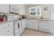 Bright kitchen featuring white cabinets and modern appliances at 558 Juniper Dr., Myrtle Beach, SC 29577