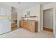 Kitchen area featuring wood cabinets and a view into the living room at 558 Juniper Dr., Myrtle Beach, SC 29577