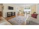 Open living space with parquet floors, comfortable couches, and a dining area at 558 Juniper Dr., Myrtle Beach, SC 29577