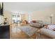 Inviting living room with neutral couches, a dining set, and natural light at 558 Juniper Dr., Myrtle Beach, SC 29577