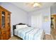 Bright bedroom with a closet, a bed, and a cabinet at 5813 Mossy Oaks Dr., North Myrtle Beach, SC 29582