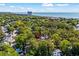 Aerial view of lush, green neighborhood near the ocean, featuring a mix of homes and tropical foliage at 6001 - 1433A S Kings Hwy., Myrtle Beach, SC 29575