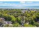 Aerial view of coastal homes nestled within trees with the ocean in the background at 6001 - 1433A S Kings Hwy., Myrtle Beach, SC 29575