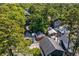 Aerial view of a property nestled among lush green trees in a residential neighborhood at 6001 - 1433A S Kings Hwy., Myrtle Beach, SC 29575