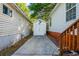 Small storage house with an anchor between two residential buildings, set in a narrow backyard at 6001 - 1433A S Kings Hwy., Myrtle Beach, SC 29575