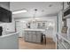 Modern kitchen with a center island, stylish pendant lighting, and a bright, airy feel at 6001 - 1433A S Kings Hwy., Myrtle Beach, SC 29575