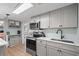 Bright kitchen featuring stainless appliances, light countertops and cabinetry at 6001 - 1433A S Kings Hwy., Myrtle Beach, SC 29575