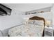 Nautical-themed bedroom with a queen-size bed and coastal decor on display shelving at 6001- 1771 S Kings Highway, Myrtle Beach, SC 29575