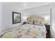 Inviting bedroom with a comfortable bed, soft lighting, and nautical-themed decor at 6001- 1771 S Kings Highway, Myrtle Beach, SC 29575