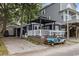 Charming beach home featuring a welcoming porch area and a convenient golf cart for easy transportation at 6001- 1771 S Kings Highway, Myrtle Beach, SC 29575