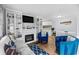 Bright living room with fireplace, built-in shelves, and a blend of modern and coastal decor at 6001- 1771 S Kings Highway, Myrtle Beach, SC 29575