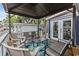 Relaxing outdoor living space featuring a covered patio with comfortable seating and stylish decor at 6001- 1771 S Kings Highway, Myrtle Beach, SC 29575