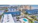 Aerial view of complex featuring a pool, parking area, landscaping, and inviting atmosphere at 6001 N Ocean Blvd. # 240, North Myrtle Beach, SC 29582