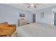 Comfortable bedroom with a chair, dresser, and king-sized bed at 6001 N Ocean Blvd. # 240, North Myrtle Beach, SC 29582