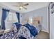 Nautical bedroom with two beds, coastal decor, and a ceiling fan at 6001 N Ocean Blvd. # 240, North Myrtle Beach, SC 29582