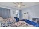 Cozy bedroom with two beds, blue accents, and beach-themed decorations at 6001 N Ocean Blvd. # 240, North Myrtle Beach, SC 29582