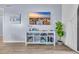 Relaxing living space featuring a mounted TV and a variety of reading materials at 6001 N Ocean Blvd. # 240, North Myrtle Beach, SC 29582