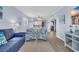 Inviting living room with blue accents, comfortable seating, and serene beach-themed decor at 6001 N Ocean Blvd. # 240, North Myrtle Beach, SC 29582