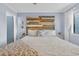 Serene main bedroom with decorative headboard and white linens at 6001 N Ocean Blvd. # 240, North Myrtle Beach, SC 29582