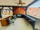 Ground-level bar and seating area beneath elevated home at 6001 - Z47 S Kings Hwy., Myrtle Beach, SC 29575