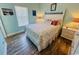 Cozy bedroom with a queen-size bed, soft linens, and beach-themed decor at 6001 - Z47 S Kings Hwy., Myrtle Beach, SC 29575