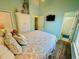 Comfortable bedroom with a queen-size bed, soft linens, and a flat-screen TV at 6001 - Z47 S Kings Hwy., Myrtle Beach, SC 29575