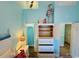 Bedroom features a tall dresser with an open cabinet for storage at 6001 - Z47 S Kings Hwy., Myrtle Beach, SC 29575