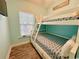 Bunkroom with a built-in bunk bed and Luxury Vinyl Plank (LVP) flooring at 6001 - Z47 S Kings Hwy., Myrtle Beach, SC 29575