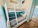 Bunkroom with a built-in bunk bed and Luxury Vinyl Plank (LVP) flooring at 6001 - Z47 S Kings Hwy., Myrtle Beach, SC 29575