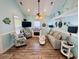 Charming living room with a fireplace, seaside decor, and comfortable seating at 6001 - Z47 S Kings Hwy., Myrtle Beach, SC 29575