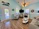 Bright living room with fireplace, complemented by seaside decor at 6001 - Z47 S Kings Hwy., Myrtle Beach, SC 29575