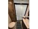 Bathroom area with a glass door shower, sink, and lavatory at 6001-N53 S Kings Hwy., Myrtle Beach, SC 29575