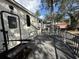 The travel trailer has an outdoor deck space, providing a great spot for relaxation and outdoor dining at 6001-N53 S Kings Hwy., Myrtle Beach, SC 29575