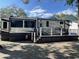 The travel trailer has an outdoor deck space, providing a great spot for relaxation and outdoor dining at 6001-N53 S Kings Hwy., Myrtle Beach, SC 29575