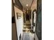 Hallway with short staircase leading to lofted bunk beds at 6001-N53 S Kings Hwy., Myrtle Beach, SC 29575