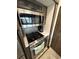 Stainless steel microwave and stove top with coffee maker at 6001-N53 S Kings Hwy., Myrtle Beach, SC 29575