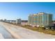 Stunning aerial view of the beachfront property and community along the coastline at 603 S Ocean Blvd. # 912, North Myrtle Beach, SC 29582