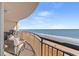 Relaxing balcony featuring comfortable seating and panoramic ocean views at 603 S Ocean Blvd. # 912, North Myrtle Beach, SC 29582