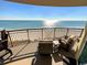 Inviting balcony seating area with stunning ocean views and comfortable furnishings at 603 S Ocean Blvd. # 912, North Myrtle Beach, SC 29582