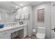 Bright, updated bathroom with white cabinets and marble countertops at 603 S Ocean Blvd. # 912, North Myrtle Beach, SC 29582