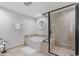 Modern bathroom featuring a soaking tub, separate shower, and neutral tile flooring at 603 S Ocean Blvd. # 912, North Myrtle Beach, SC 29582