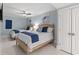 Cozy bedroom features two beds and matching blue and white décor at 603 S Ocean Blvd. # 912, North Myrtle Beach, SC 29582