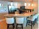 Contemporary kitchen with stainless steel appliances, granite countertops, and barstool seating at 603 S Ocean Blvd. # 912, North Myrtle Beach, SC 29582