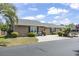 Charming home featuring a landscaped front yard, concrete driveway, and well-maintained exterior, perfect for suburban living at 634 Cypress Ln., North Myrtle Beach, SC 29582